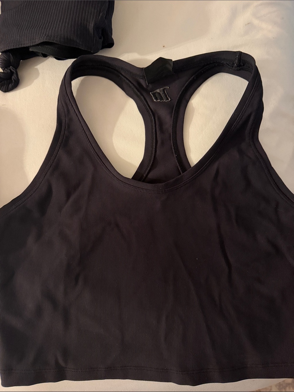 Black Racerback cropped Muscle Nation top (not a sports bra)